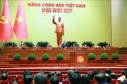 Генеральный секретарь ЦК КПВ XIII созыва То Лам выступает на XIV всевьетнамском съезде КПВ. (Фото: ВИА).