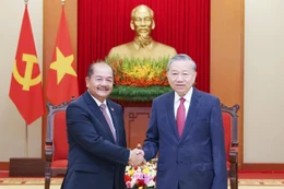 Генеральный секретарь То Лам принимает товарища Кикео Кхайкхампхитуна, члена Политбюро, заместителя премьер-министра Лаоса. Фото: ВИА.