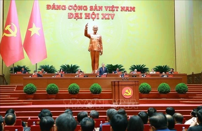 Генеральный секретарь ЦК КПВ XIII созыва То Лам выступает на XIV всевьетнамском съезде КПВ. (Фото: ВИА).